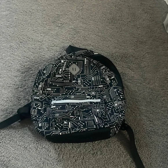 a black designed back pack - Picture 1 of 4
